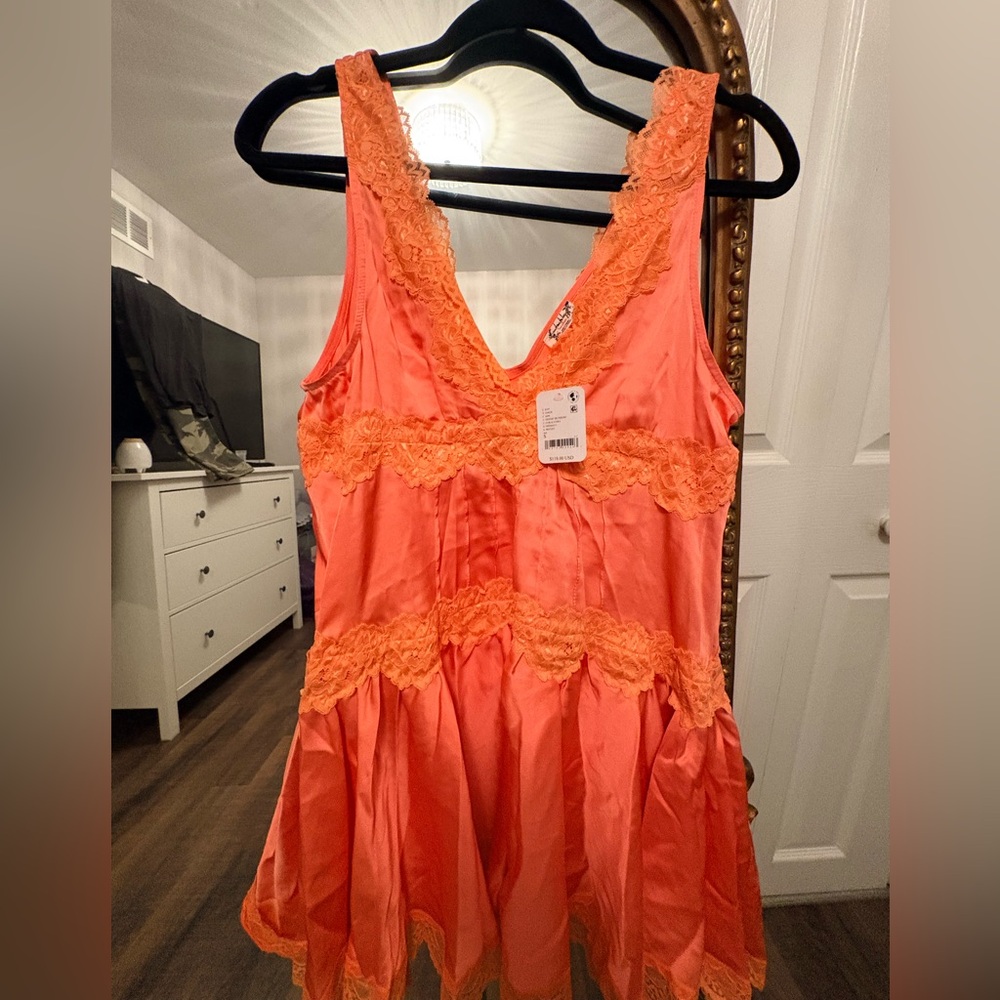 Free People In this groove satin mini slip . Size S. Desert Blossom